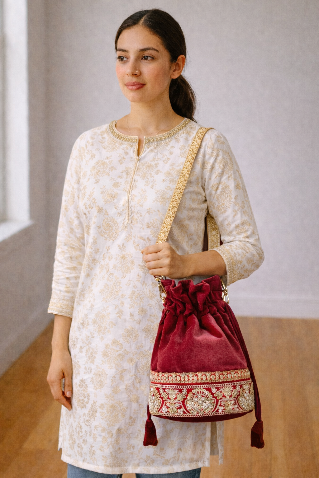 Embroidered Cotton Velvet Potli Bag cum Mini Sling in Red